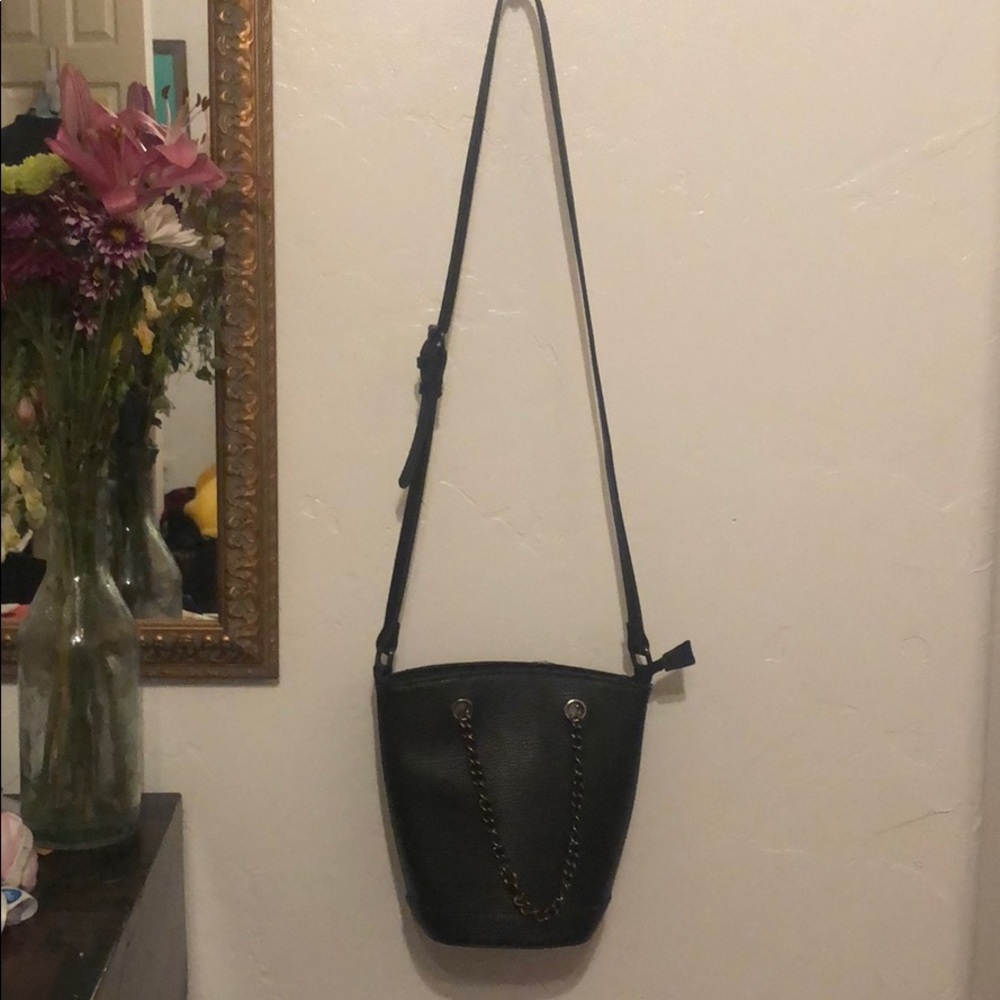 Black faux leather over the shoulder bag. So cute!